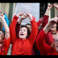 Speaking of I.M.E.L.D.A perform at the protest outside the Irish Embassy